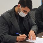 Firma de contrato del Tesista Nicolás Manuel Guggiari Burian.