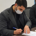 Firma de contrato del Tesista Nicolás Manuel Guggiari Burian.
