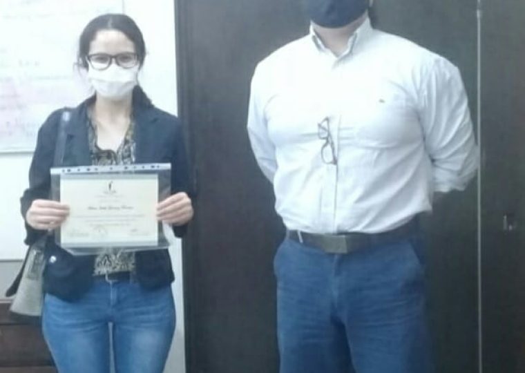 Melina Giménez y el Dr. Roberto Martínez López (Director del PUBIABM).